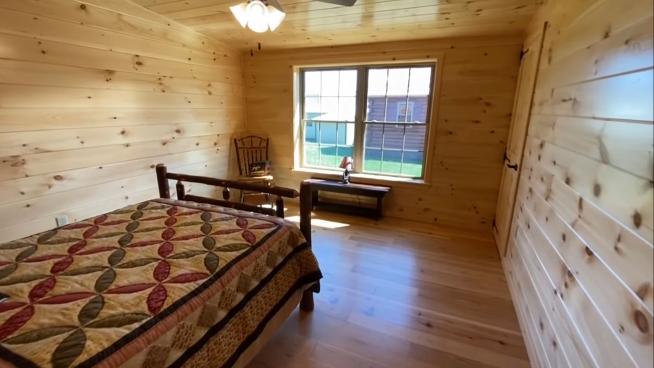 modular log home bedroom