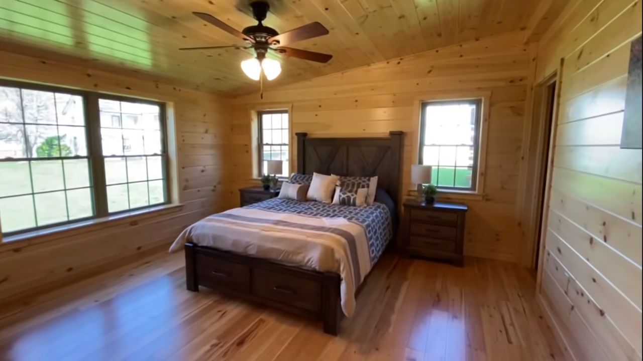 modular log home master bedroom