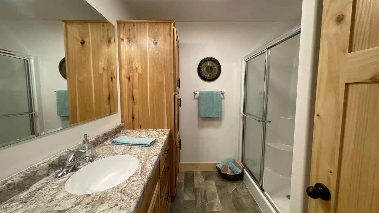 rustic cabin modular home master bathroom